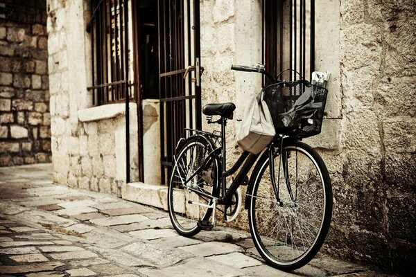 Bicycle with basket on the city street