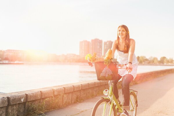 A girl s good mood against the background of the sun