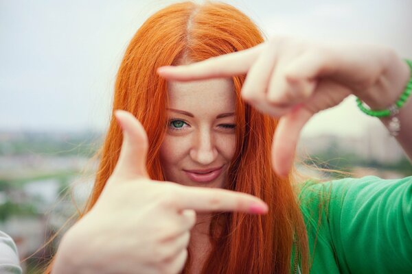 A red-haired girl with a good mood