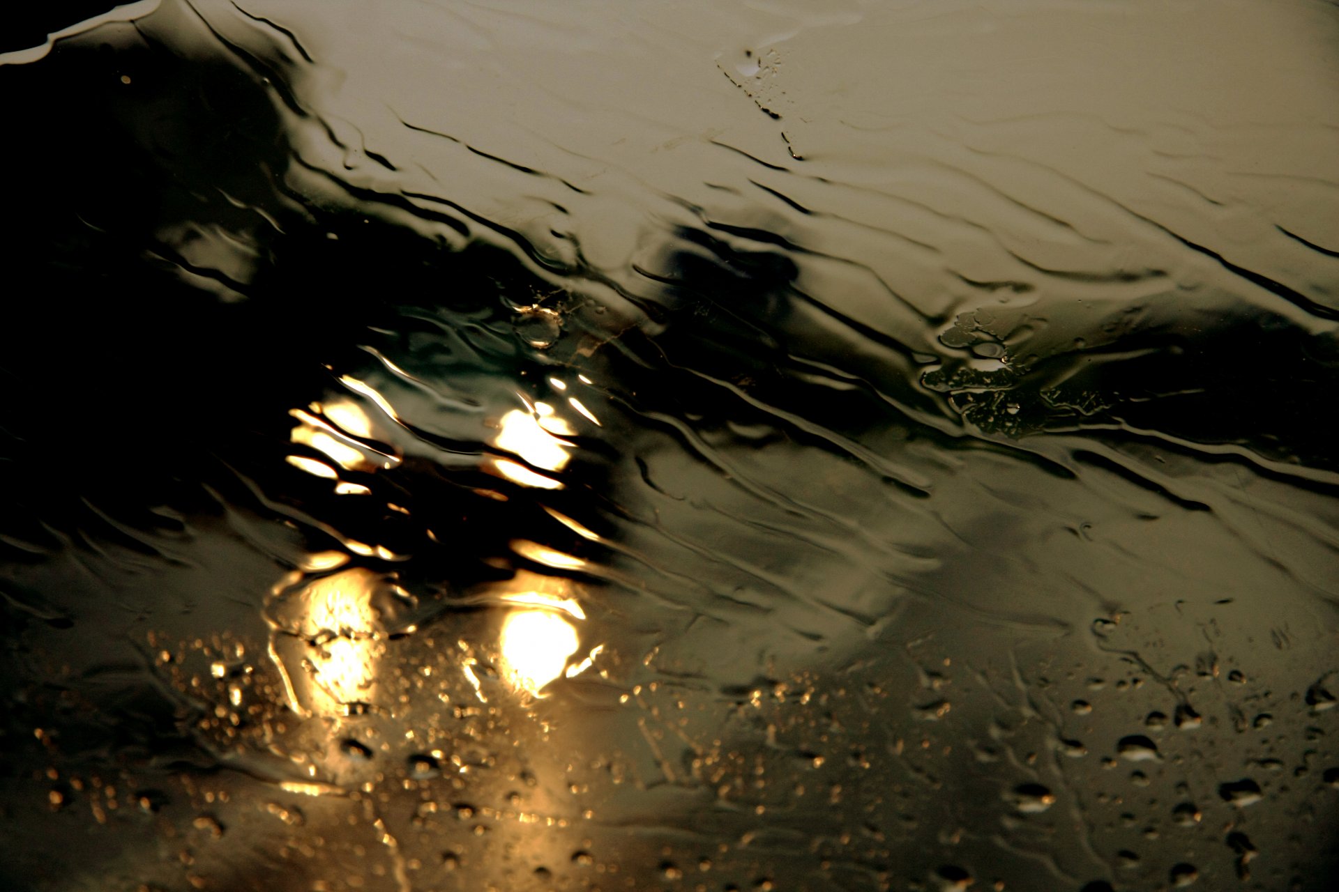 night road rain downpour glass water drops stream