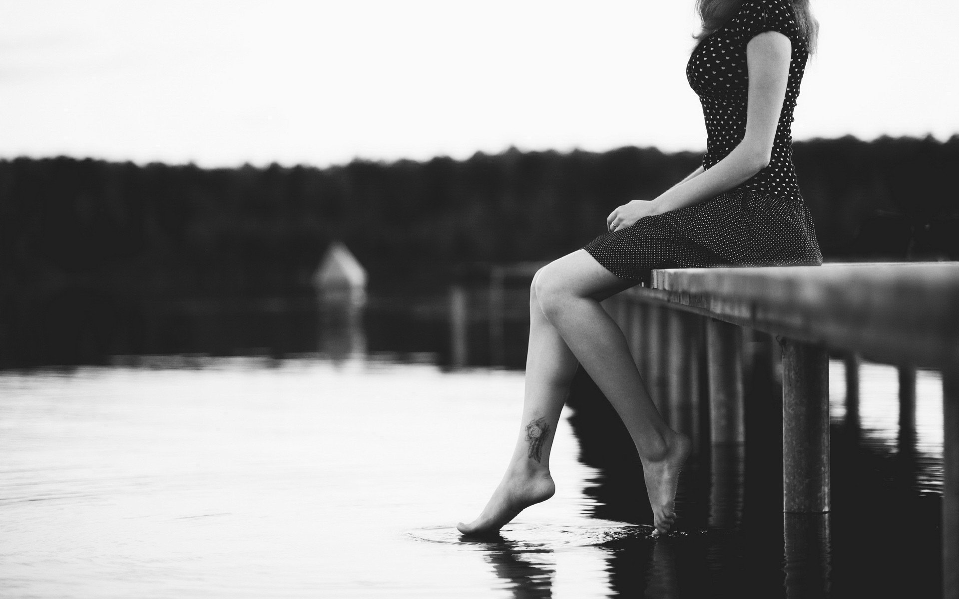 mood girl feet sea river water . black and white background wallpaper