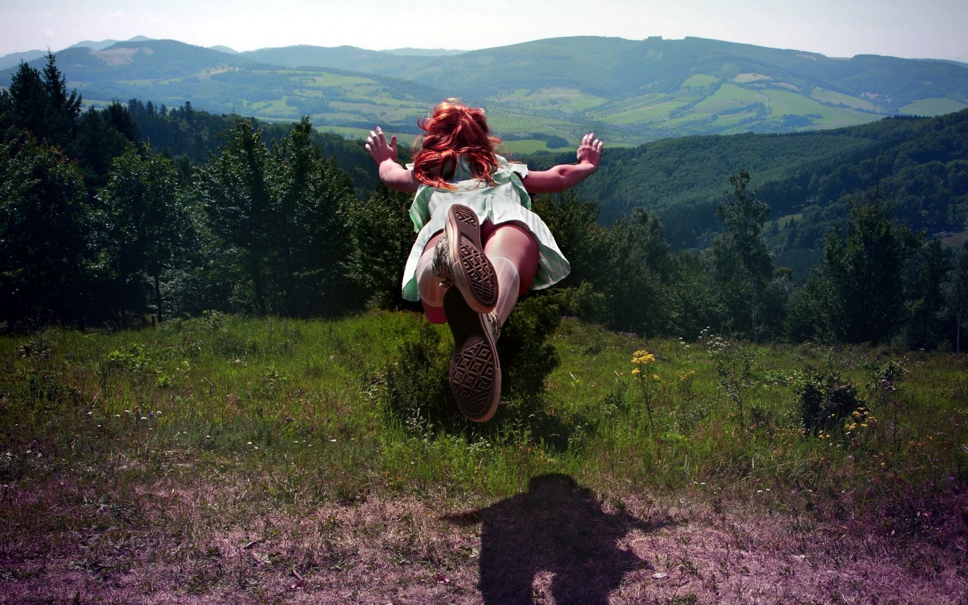 girl jump nature forest mountain hills grass tree green positive