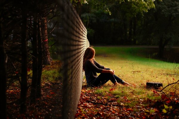 Thoughtful girl on the field