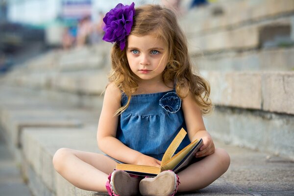 Reading girl on the street