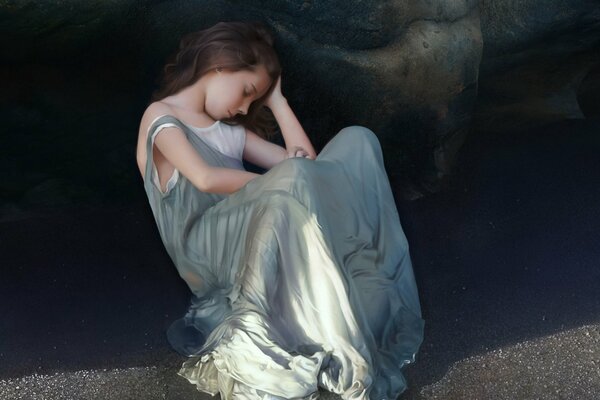 A sleeping girl leaning against a rock