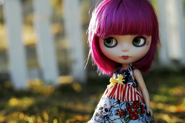 Beautiful doll with crimson hair