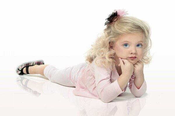 Photo shoot of a charming baby with blue eyes