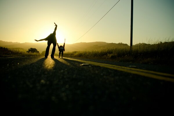 Travelers are walking along the road