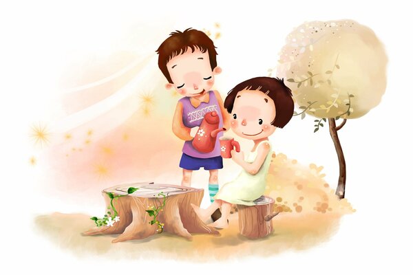 Chłopiec i dziewczynka piją herbatę