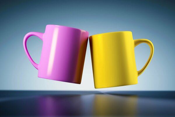 Paire de tasses de différentes couleurs