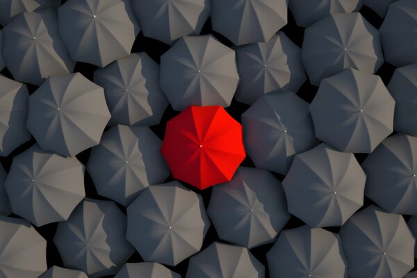 Red umbrella among black umbrellas