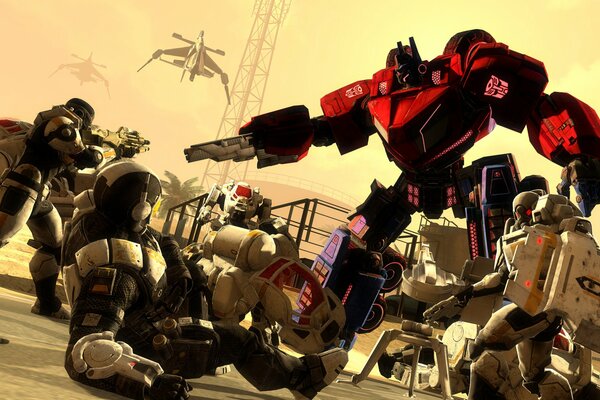 Battaglia del robot. Transformers sullo sfondo di Wasteland e droni