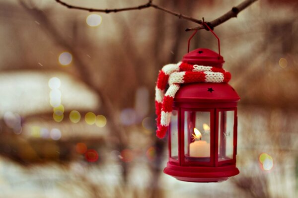 A red lantern with a candle inside