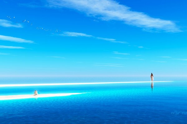 A girl walking on a shallow part of the ocean near the shore