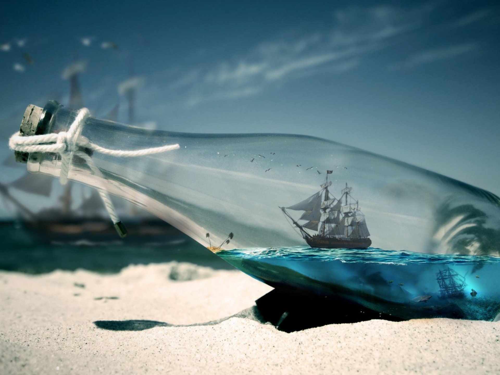 boat in a bottle sea sand