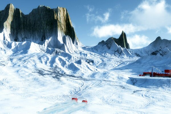 L hiver la station sur un fond de montagnes