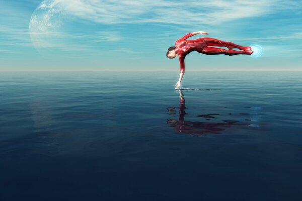 A girl in a red suit over the surface of the sea