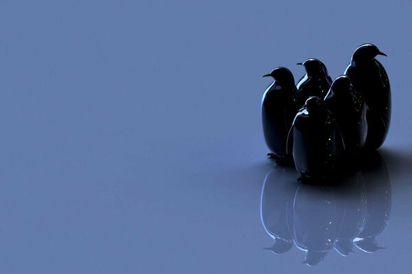 Dark Penguin figures with reflection