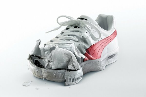 The flattened toe of the sneaker. Interesting photo