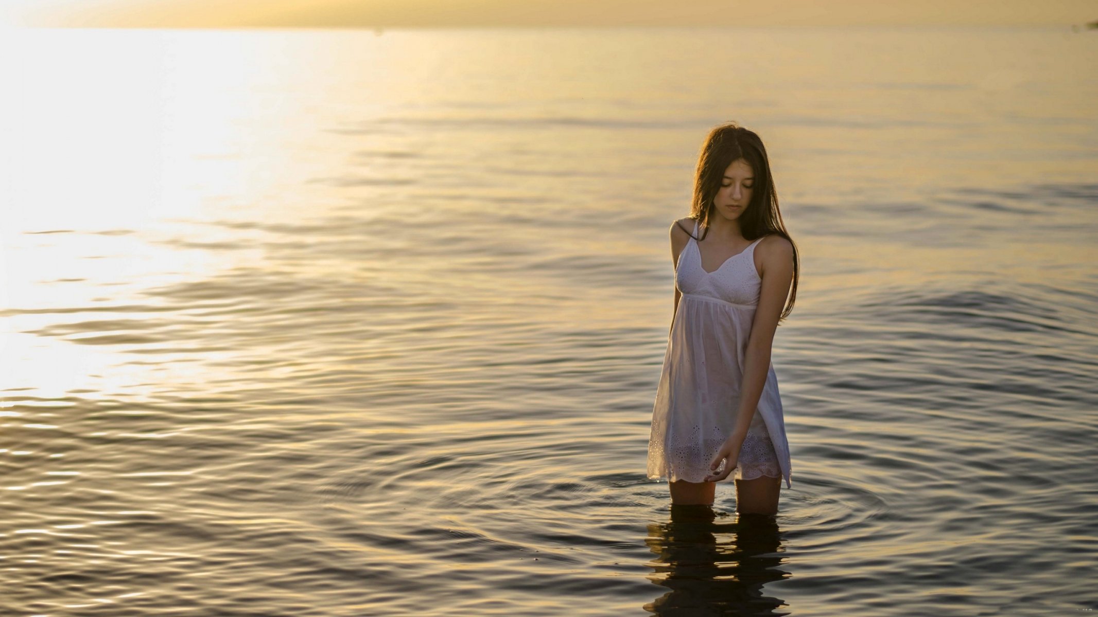 girl brown hair shirt nightie water surface ripple following horizon