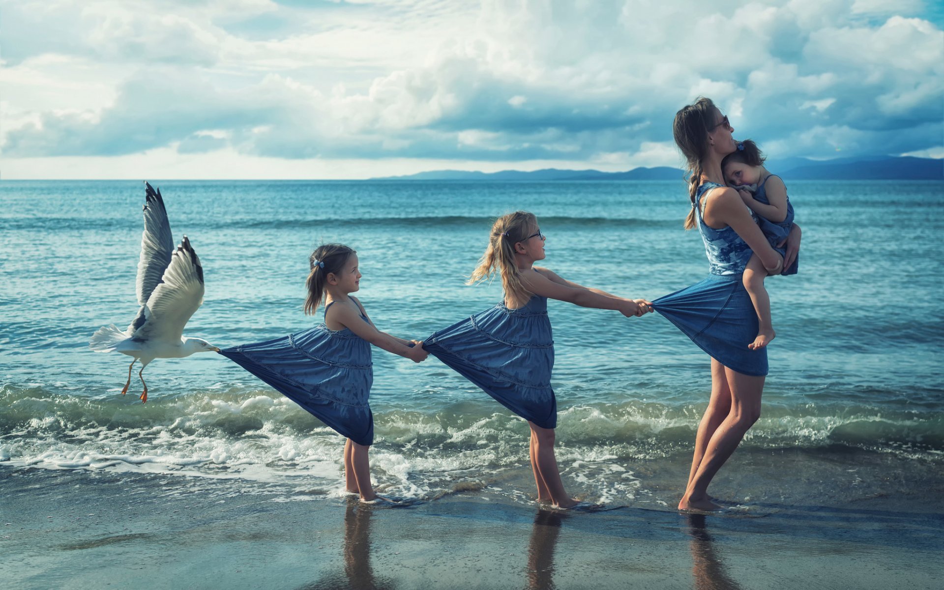 girls mother seagull beach wave