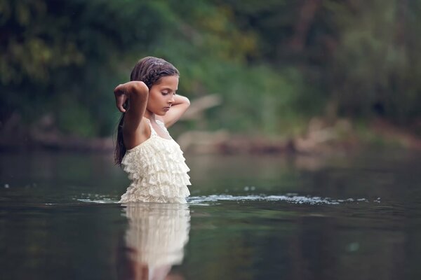 Young model Veselina Alexandrova in the water