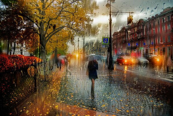 Sankt Petersburg. Październik. Dziewczyna pod parasolem