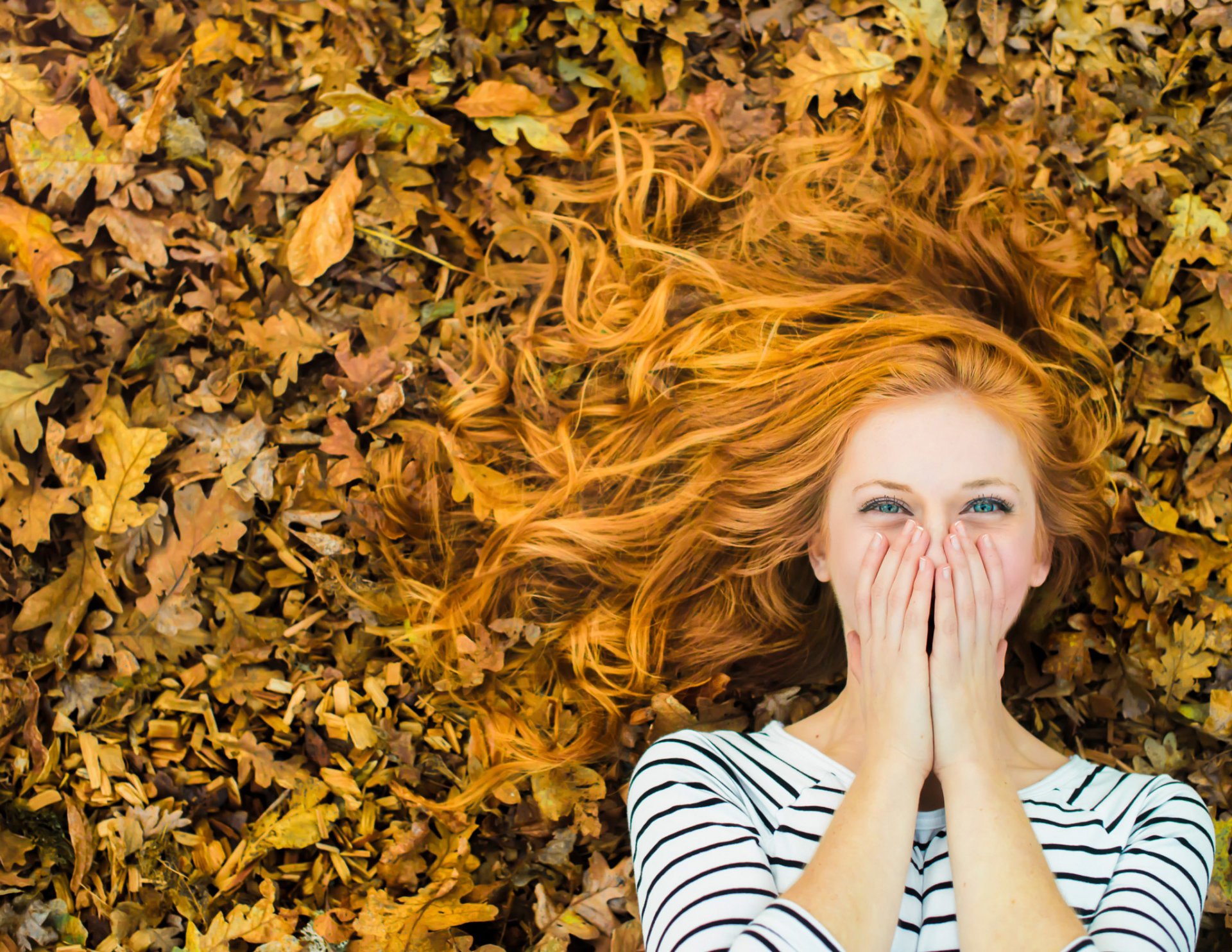 girl red hair laughter autumn leaves happine