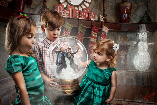 Children look at their parents trapped in a glass ball