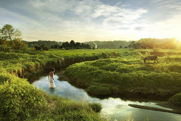 The girl entered the river