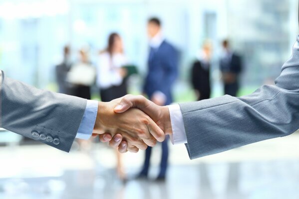 A handshake before a business transaction