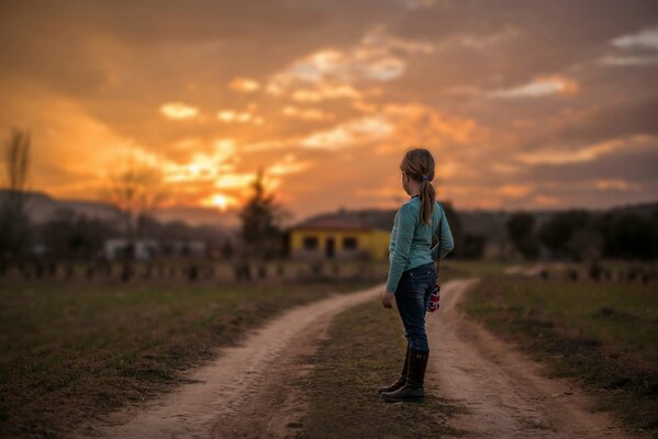 The girl leaves during sunset