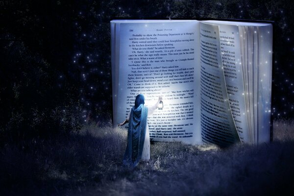 A big book is being read by a girl with a lantern