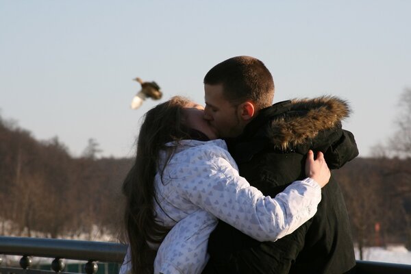 A strong kiss from a loving couple