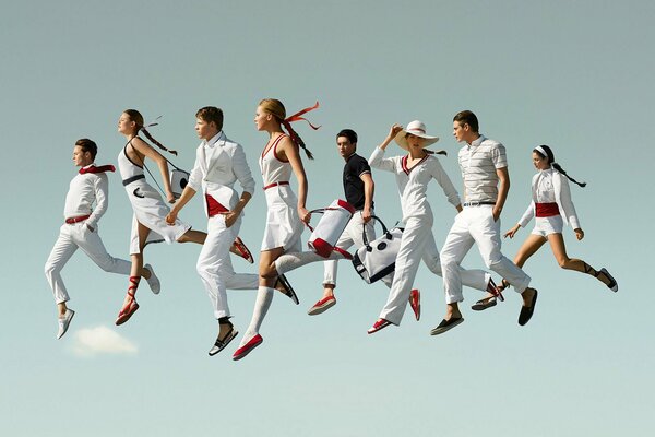 People in white floating in the sky