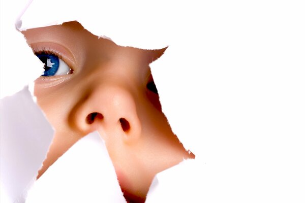 Blue-eyed child on a white background