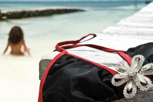 Girl s vacation at the sea in a swimsuit