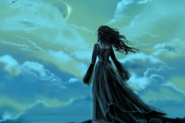 A girl in a long dress looks at the sky