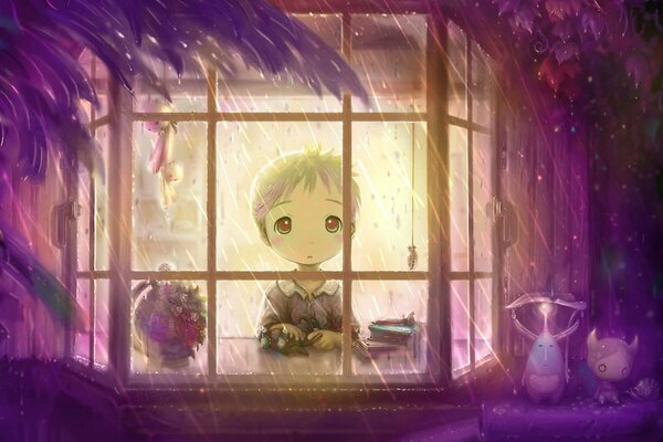 A boy in the rain in front of the window