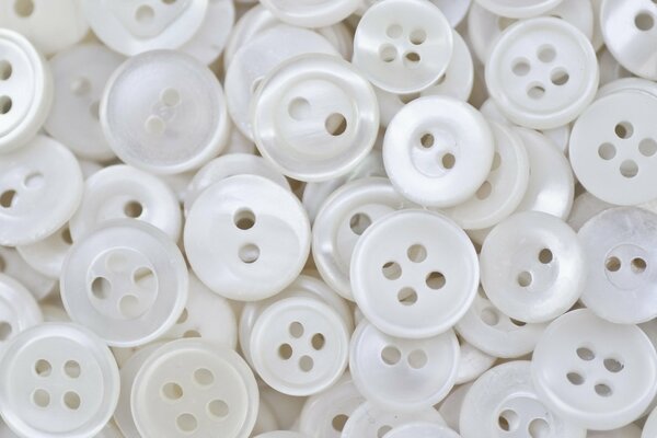 Background of white buttons, macro