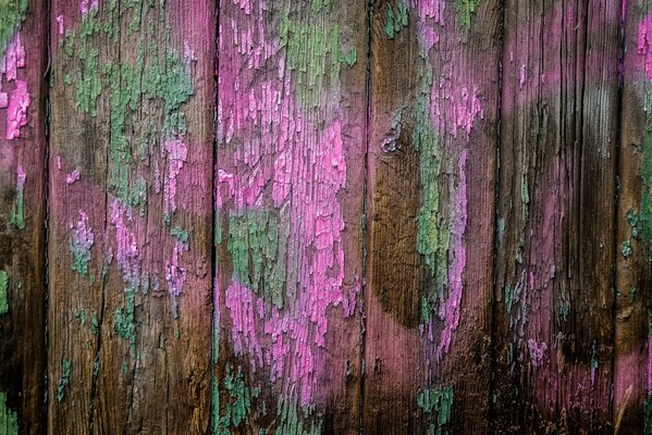Old paint on fence boards