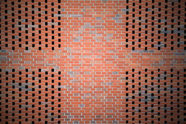 The wall in the form of brickwork