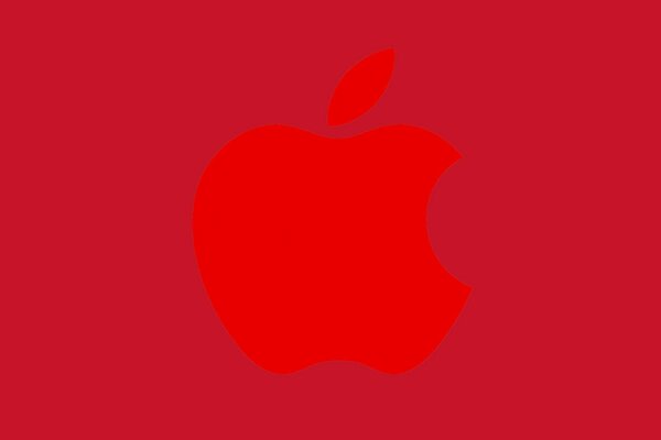 Emblema de la manzana sobre fondo rojo