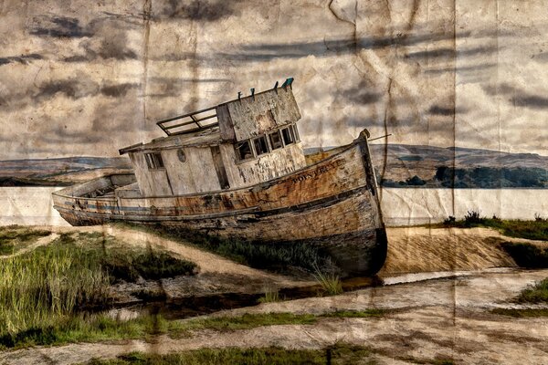 Vecchia nave abbandonata sulla riva del fiume