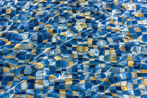 Mosaic texture with ripples in the pool