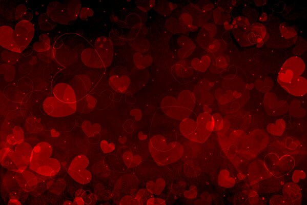 Lots of red hearts on a dark background