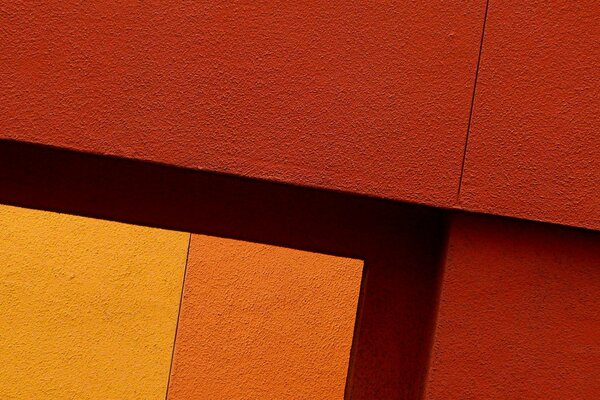 Texture de mur lumineux sur fond rouge