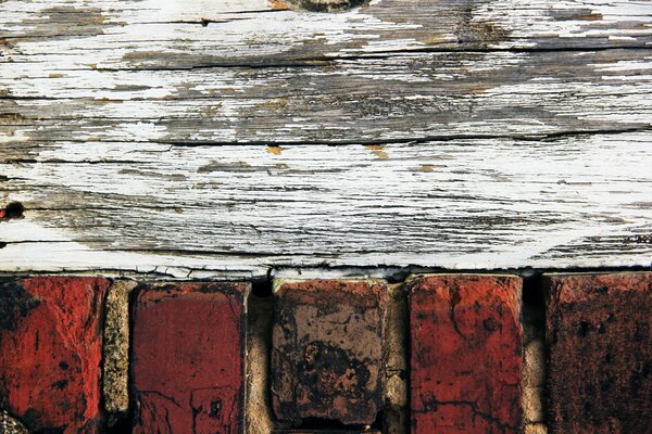 Texture of aged boards with cracked paint