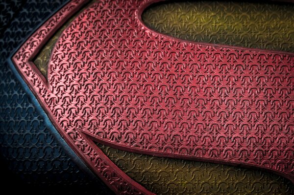 Fondo de textura con el emblema de Superman