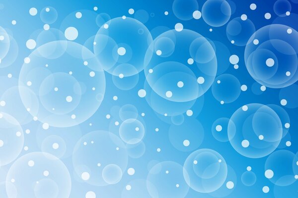 Dots and circles on a blue background